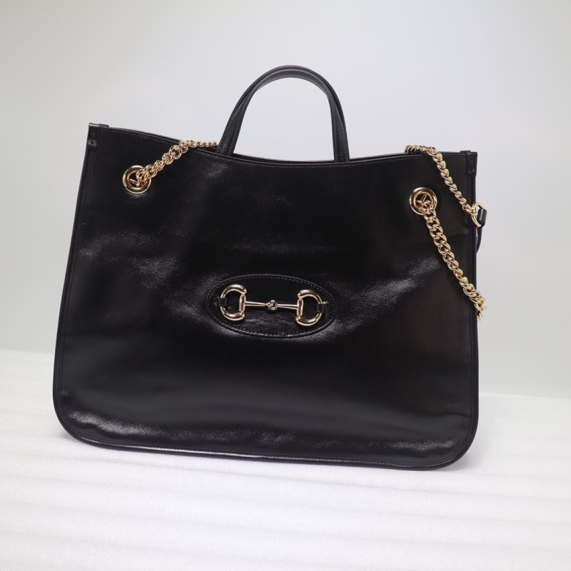 G*u*i shopping bags